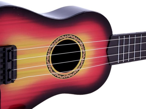 Zabawka Gitara metalowe struny + piórko